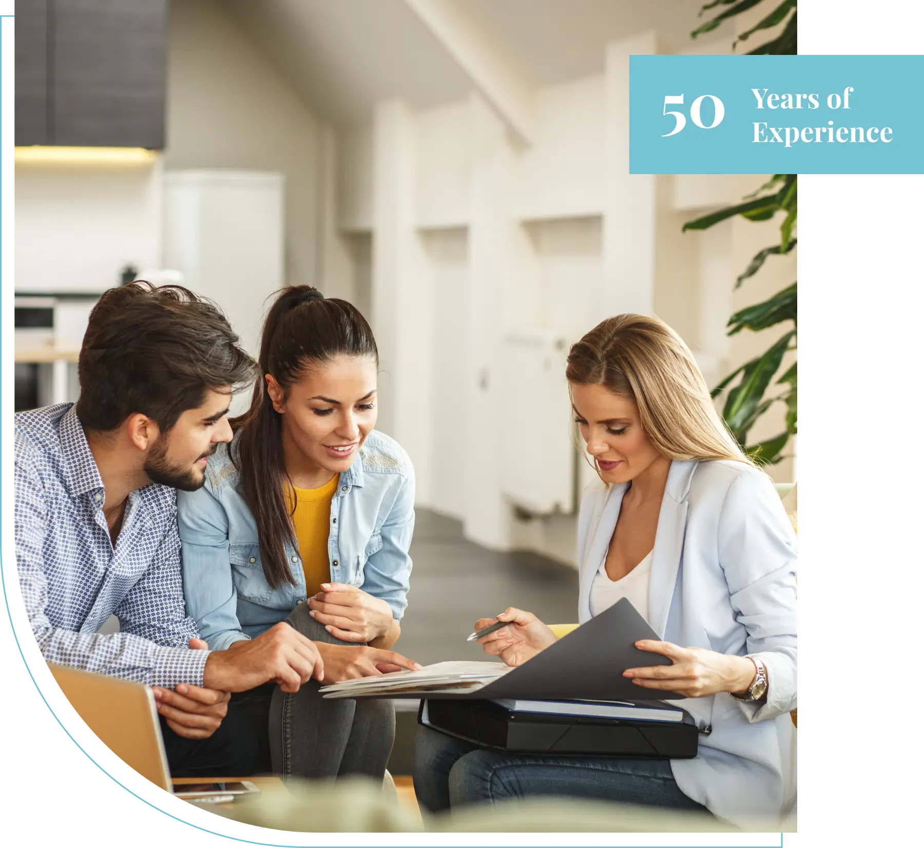 Real estate agent reviewing contract with couple